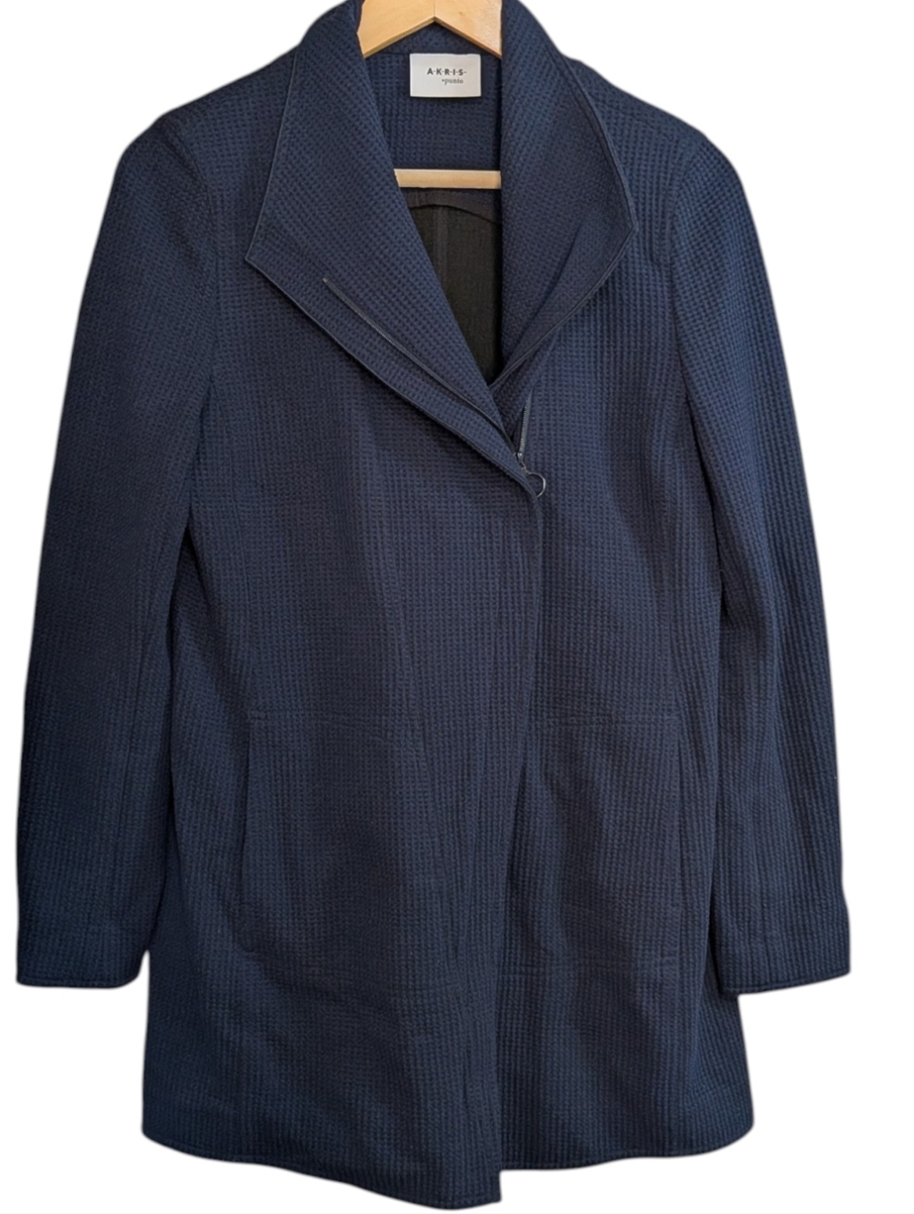 Akris Punto brand item featuring a structured, textured design...Size 10